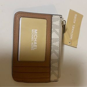 Michael lots center stripe credit card holder. NWT.